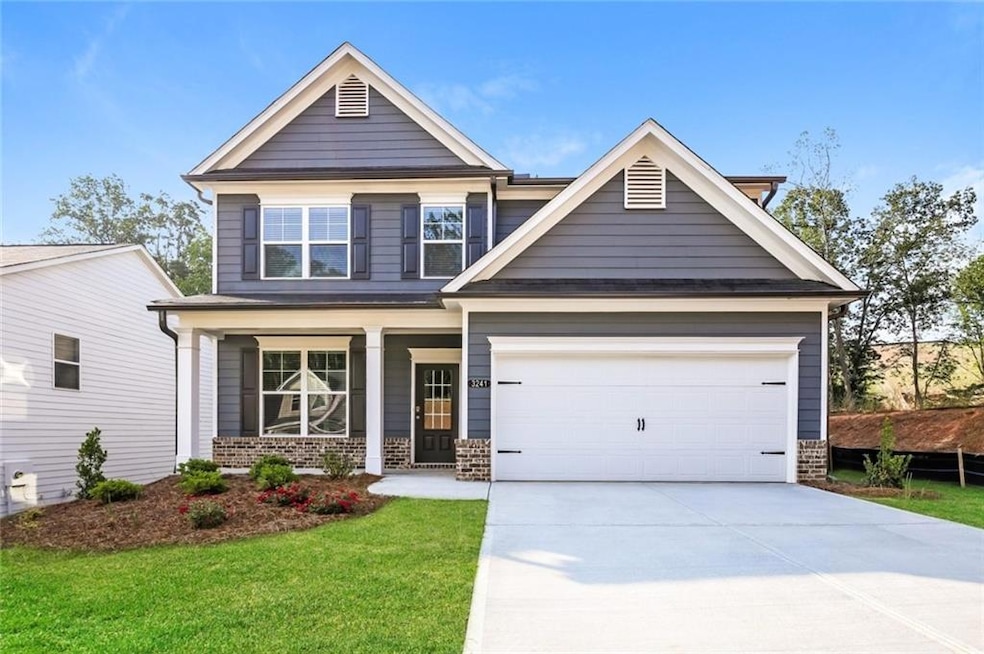 View of front of house with an attached garage, dr