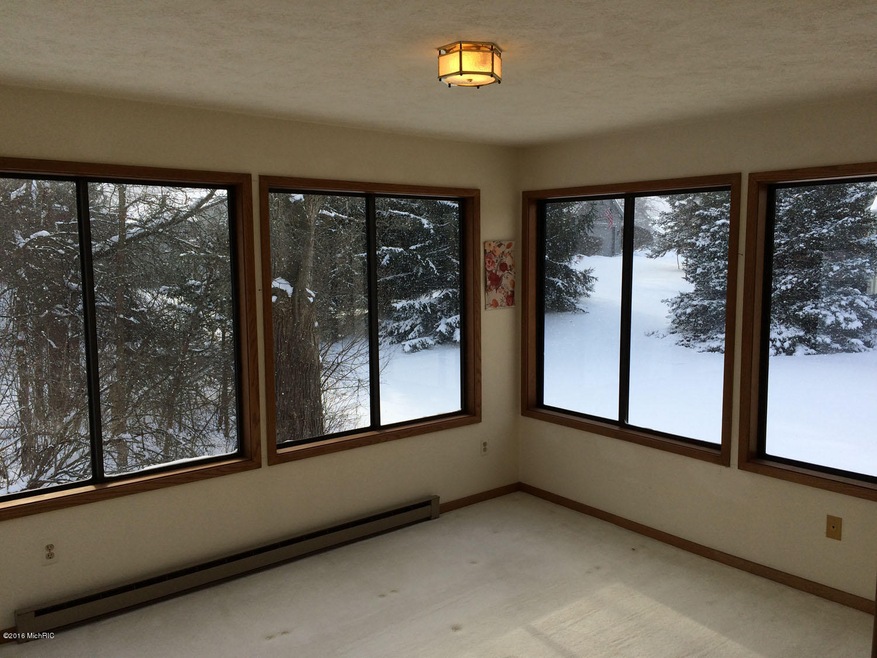 5056 N Quail Crest Dr SE unit 18, Grand Rapids, MI 49546 - photo 1