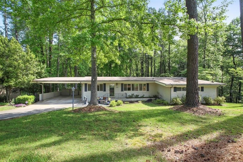 Beautifully renovated mid-century ranch on .8 acre