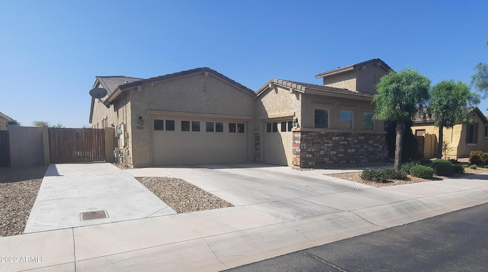 3 car garage & RV gate
