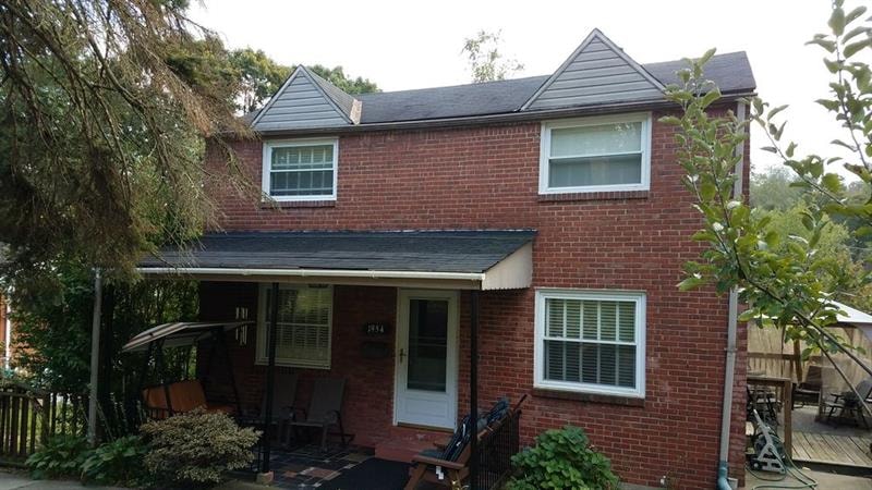 Covered front porch welcomes you to this 2 story b