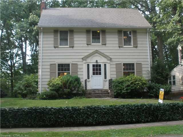 Exterior Front. Curved entry way