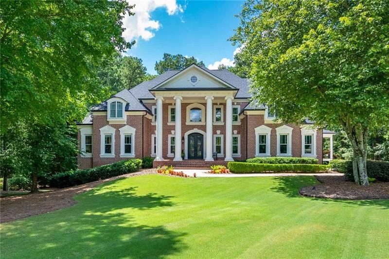 Grand southern Colonial design on almost 2 acres