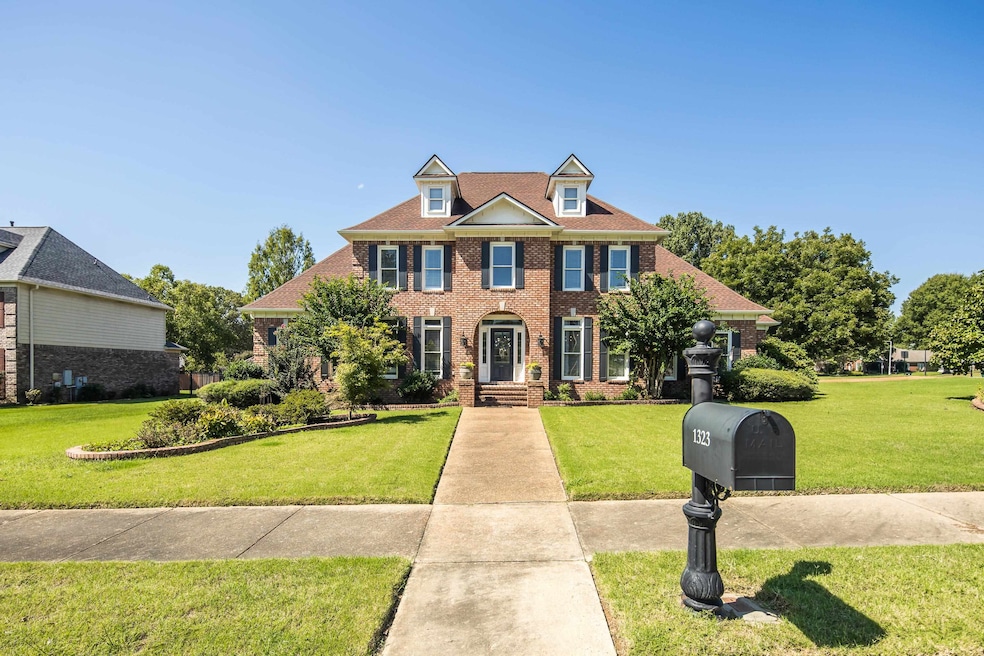 View of front of house with a front lawn