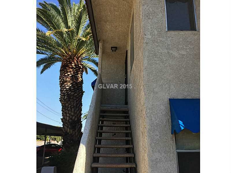 Facade/Exterior Front. Entrance to unit