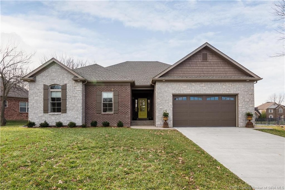 Welcome Home to this exception brick and stone ran