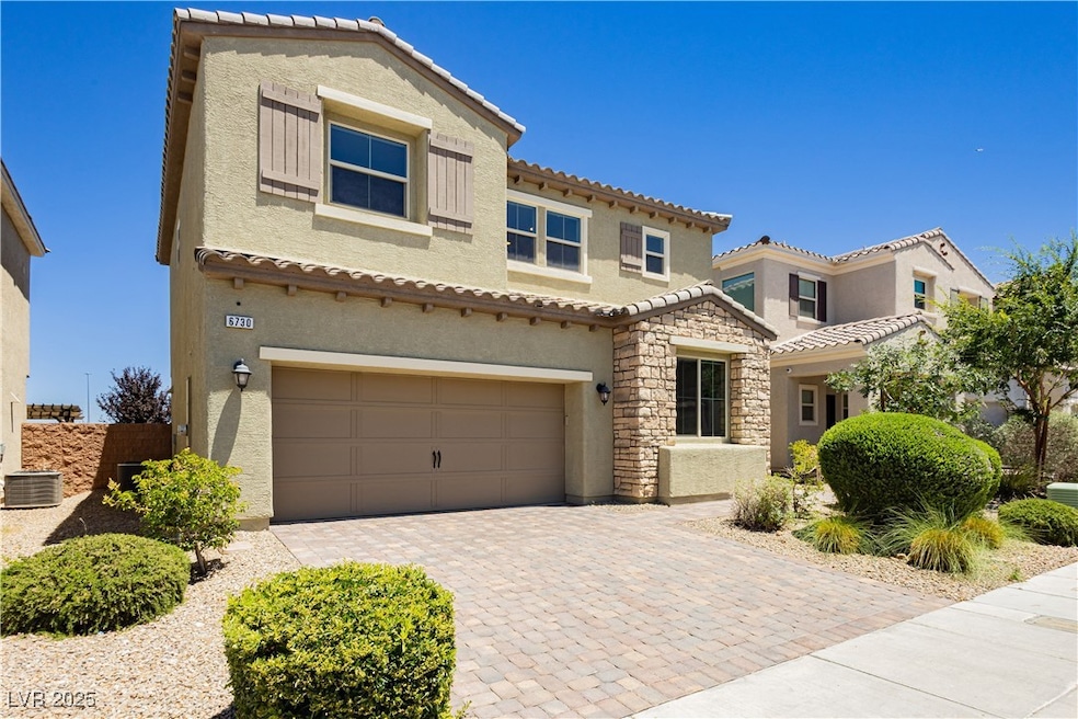 Mediterranean / spanish house featuring a garage,