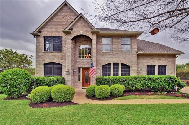 Front Exterior - Beautiful Landscaping!