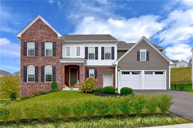 Almost new Charter Home's Lamont floor plan. Brick & Hardi Plank exterior, many upgrades & expanded floor plan. Located in Woodside, one of Cranberry's newest communities.