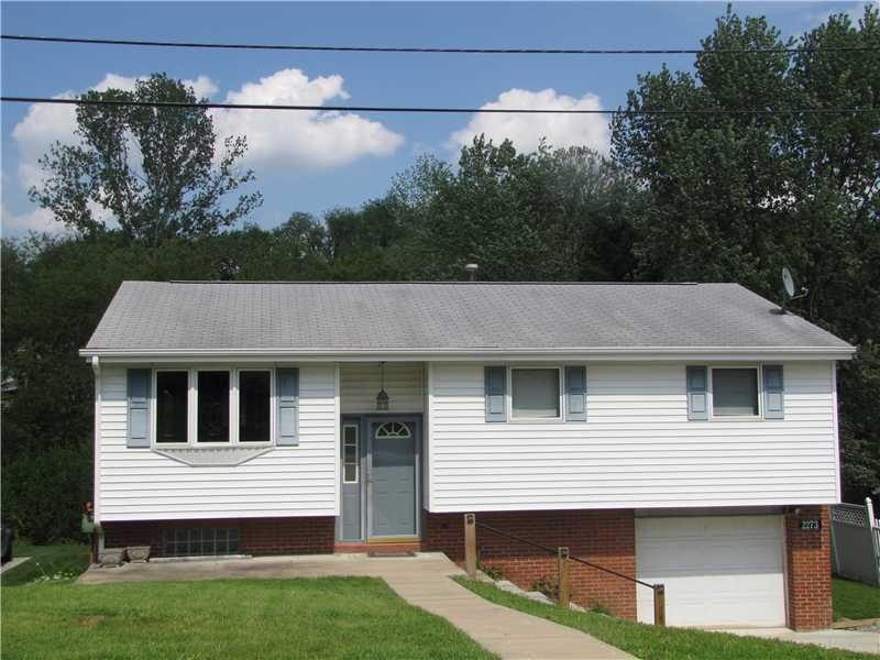 Exterior Front. Split level home on a quiet street