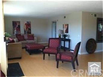 Spacious Living room with fireplace (staged)