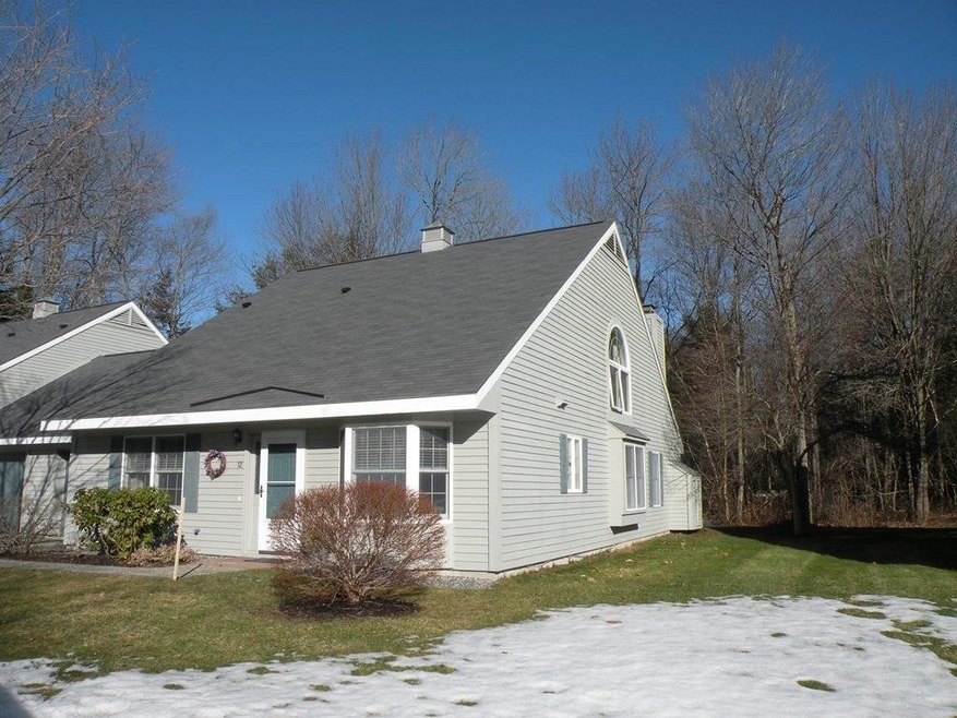 Exterior - end unit with wooded backyard