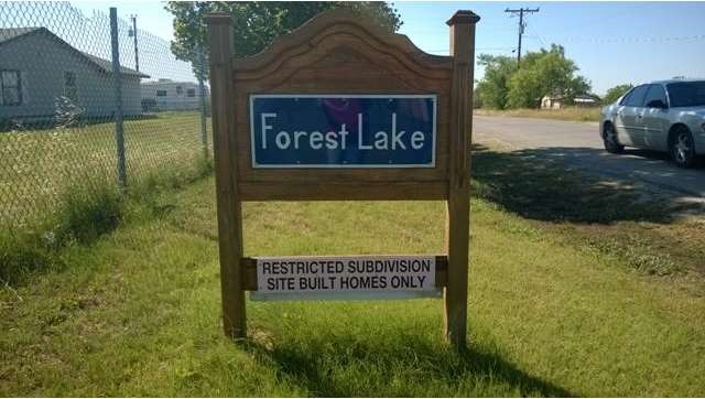 1.9 acre lot in Forest Lake a restricted subdivisi