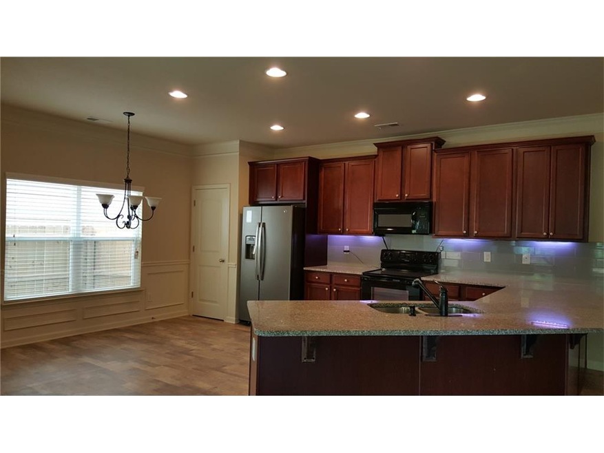 3079 Woodward Down Trail, Buford, GA 30519 - photo 1