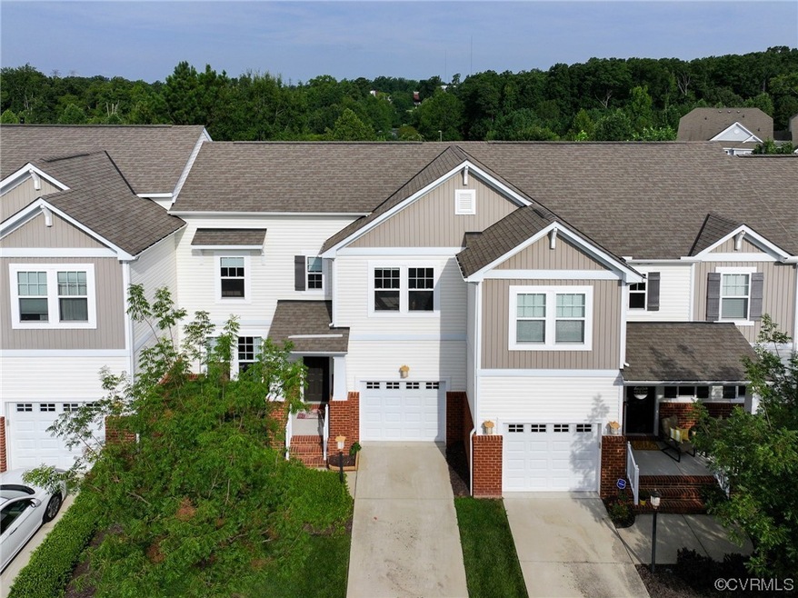 View of front of property with garage