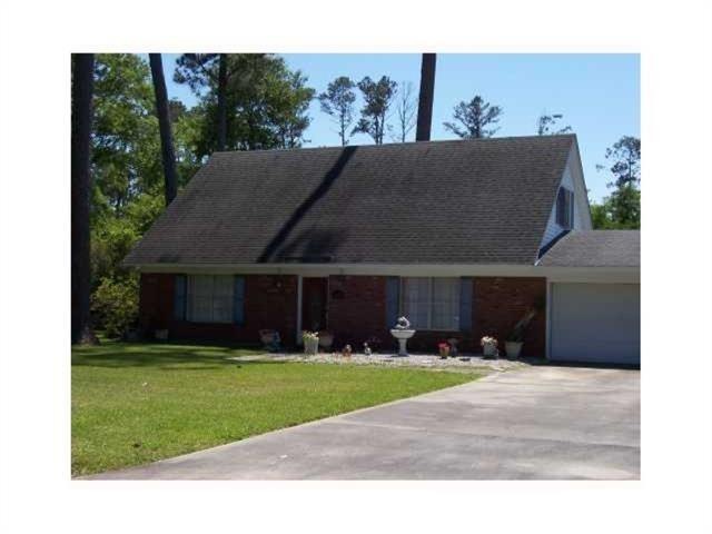 1209 W Magnolia St, Covington, LA 70433 - photo 1