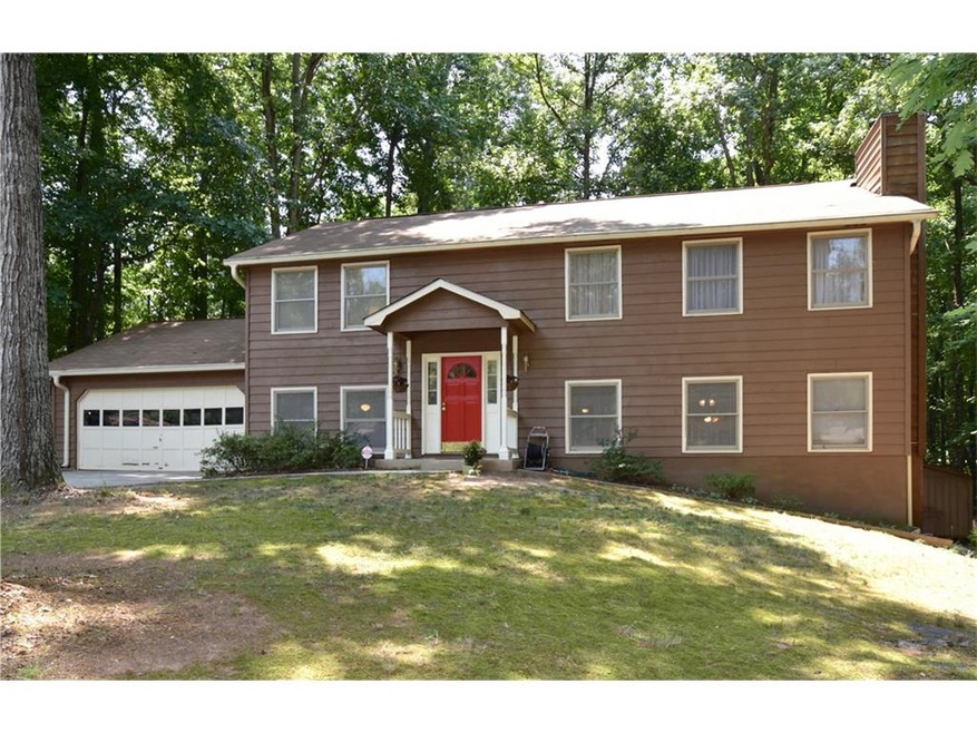This lovely home sits on a quiet, wooded cul-de-sa