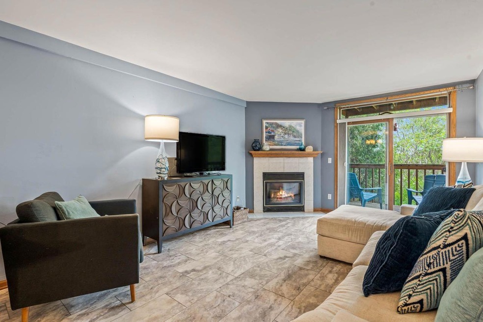 NEWER LVT, Gas Fireplace & Patio Doors!