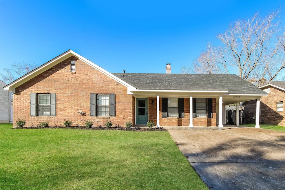 Ranch-style home featuring a porch, a front yard, 