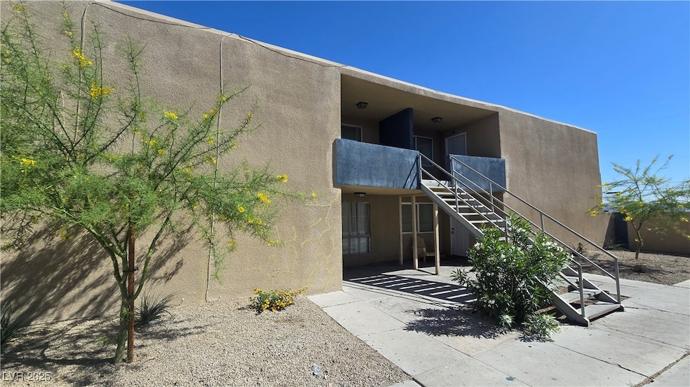 View of exterior entry featuring a patio area and