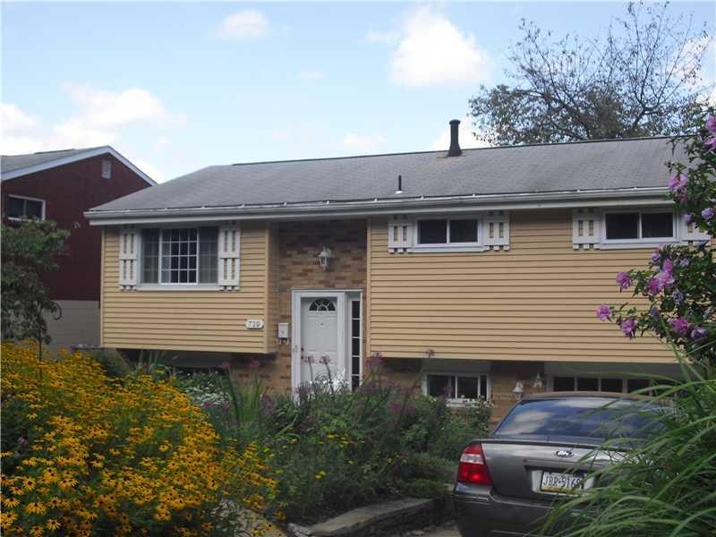 Exterior Front. The front yard welcomes you with a