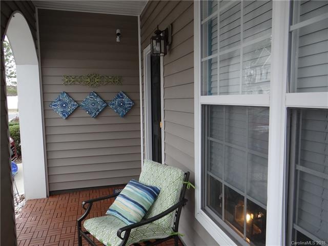 Front porch with parquet wood overlay