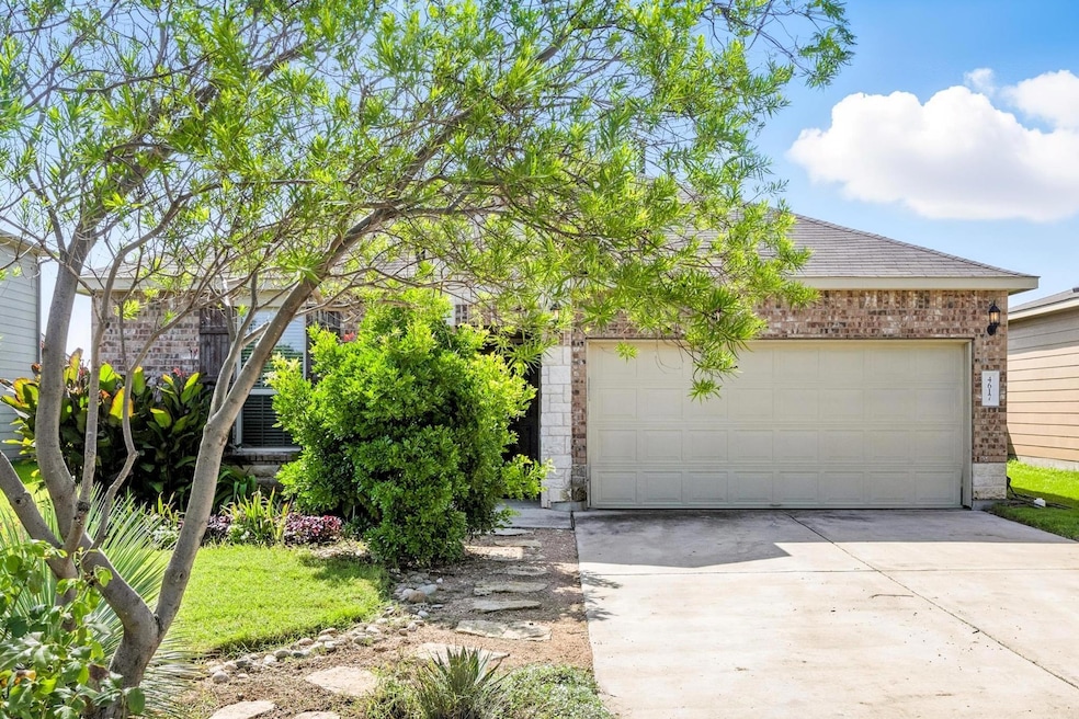View of front of home featuring concrete driveway