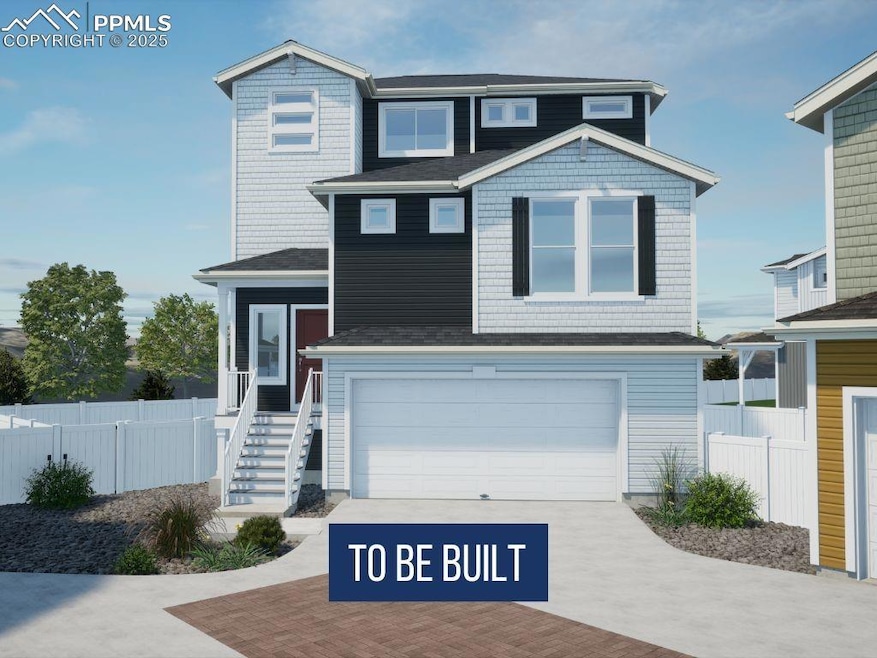 View of front of home featuring a garage