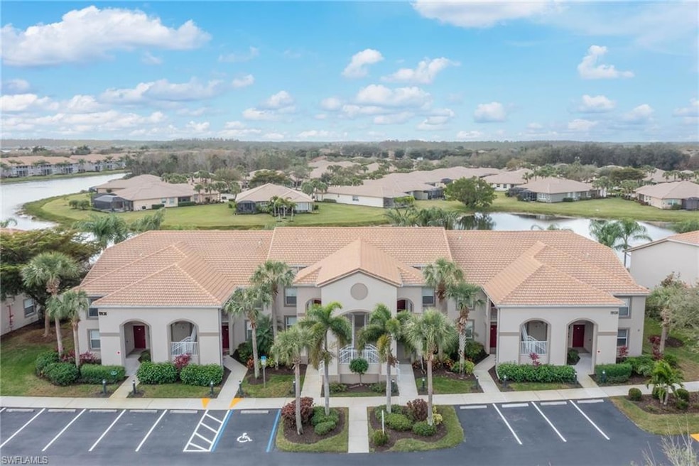 Aerial perspective of suburban area with a nearby body of water