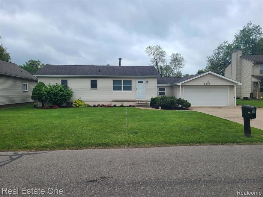 Wolverine Lake Ranch Style Home with many recent I