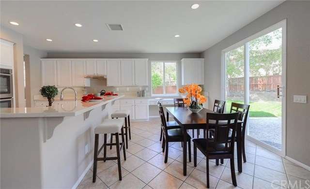 Beautiful remodeled kitchen with nook. Sliding doo
