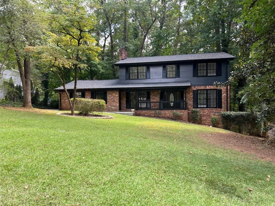 Welcome Home to Dunwoody North! This home showcases a modern renovated exterior.