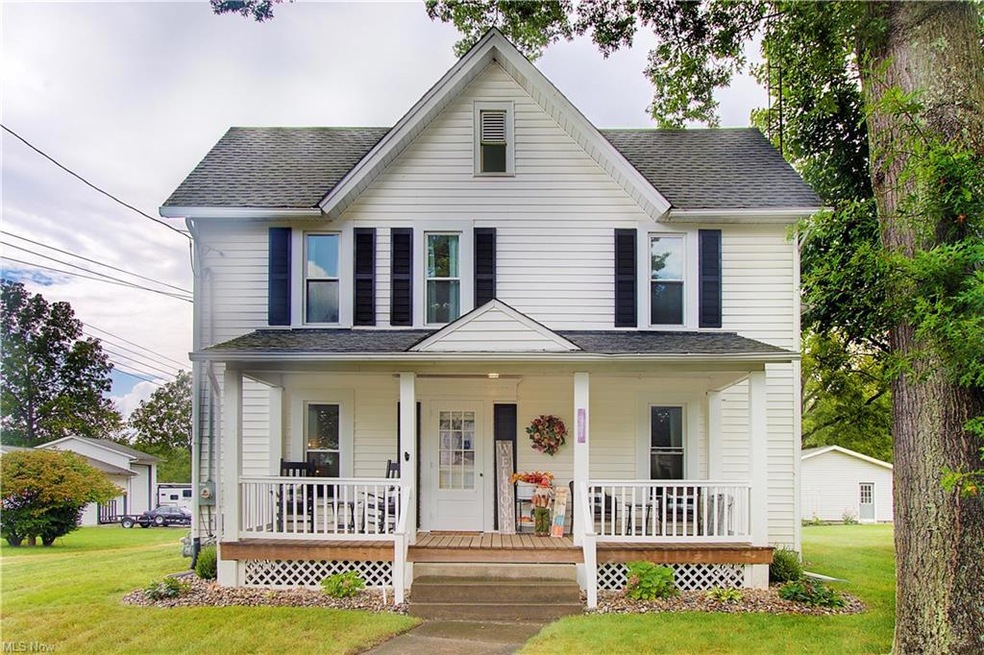 East View of front of property featuring a porch a