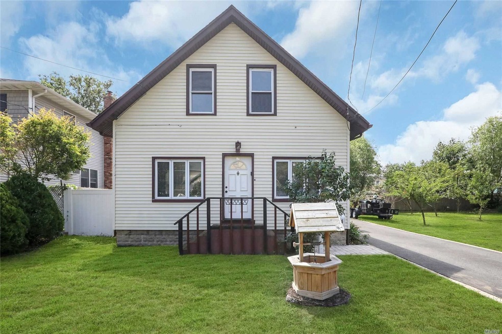 74 Scudder Ave, Copiague, NY 11726 - photo 1