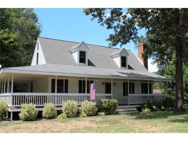 Welcome home to this Cape Cod home with wrap-aroun