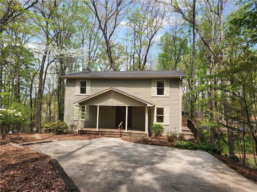 View of front of house with covered porch