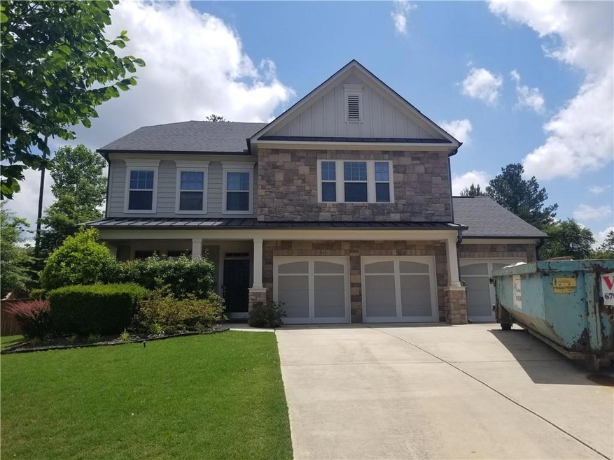 Craftsman-style home featuring a front lawn and a 