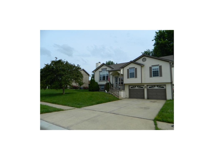 113 W Laredo Trail, Raymore, MO 64083 - photo 1