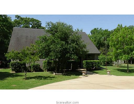 Exterior Front. Beautiful setting for relaxing!  B