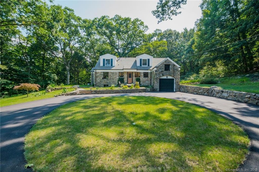 Perfectly sited on 2.62 lovely acres located minut
