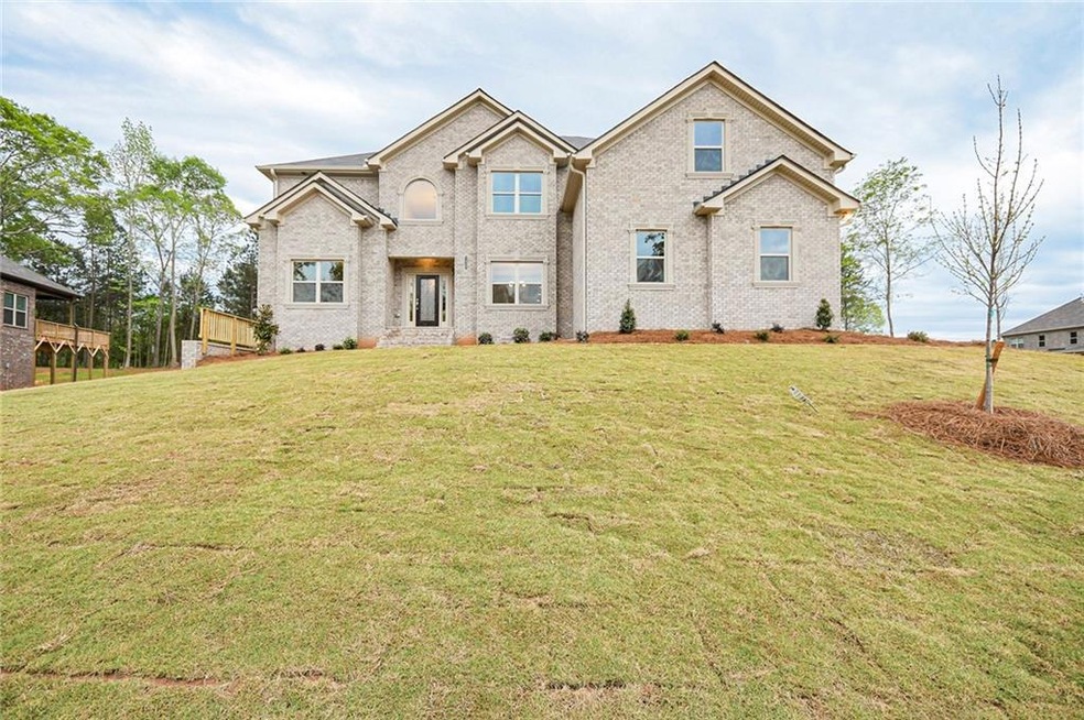 View of front of home featuring a front lawn