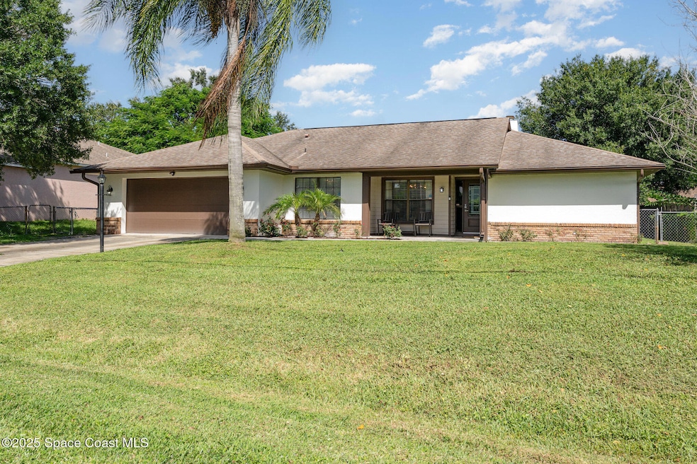 1495 Wake Forest Rd NW, Palm Bay, FL 32907 - photo 1