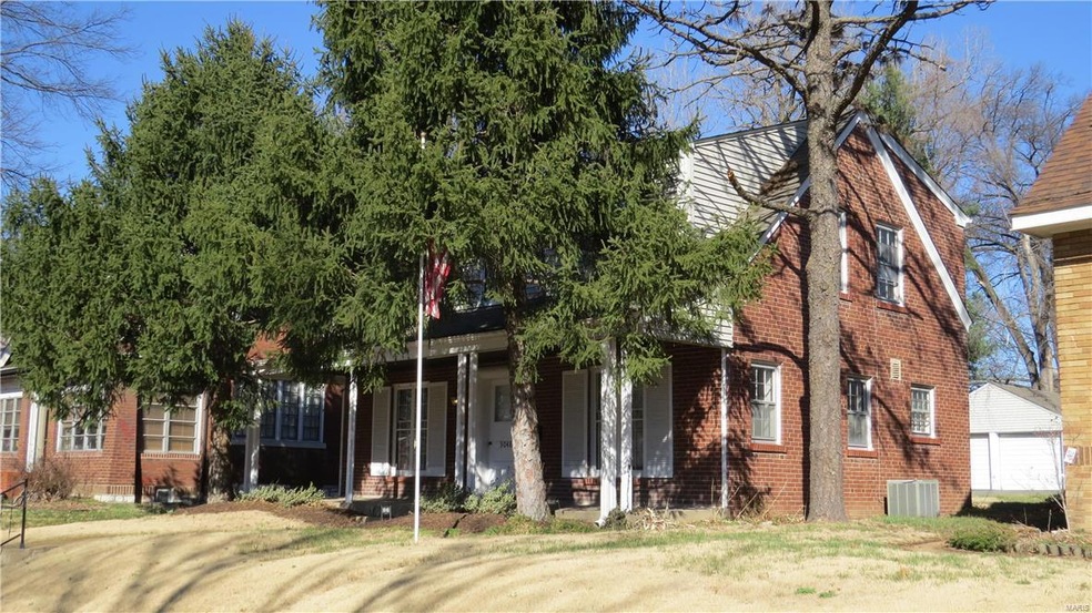3048 Arlmont has brick on all sides; the two car d