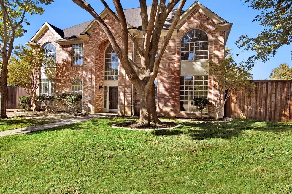 View of front of property with a front lawn