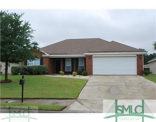 Exterior Front. Beautifully Landscaped Front Yard