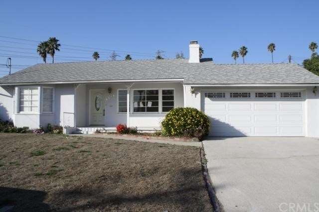 Attached garage, covered porch area. 