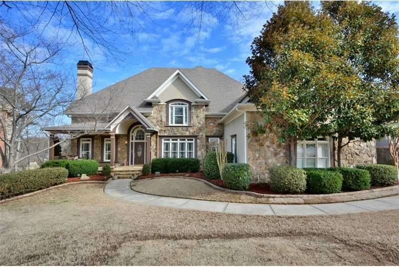 Exterior Front. Fantastic hardcoat stucco/stone ho