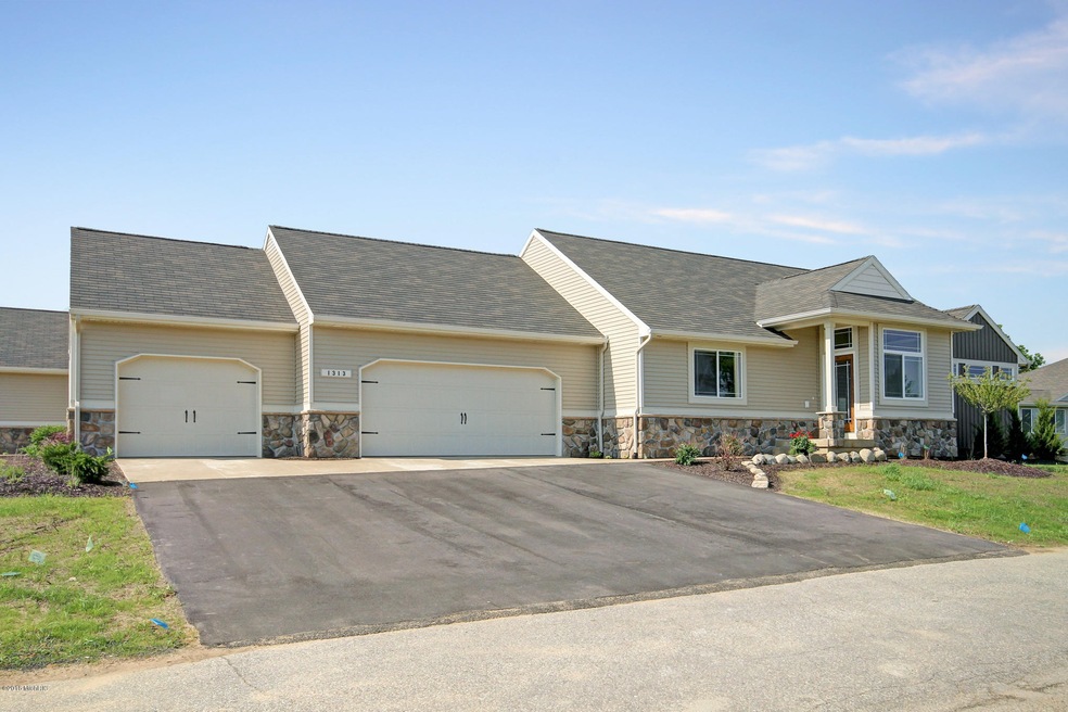 1313 Sand Springs SW unit 42, Byron Center, MI 49315 - photo 1