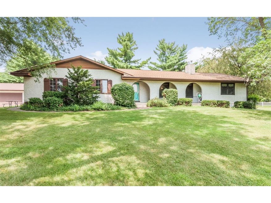 Spacious ranch design set on 3.3 acres. The perfec