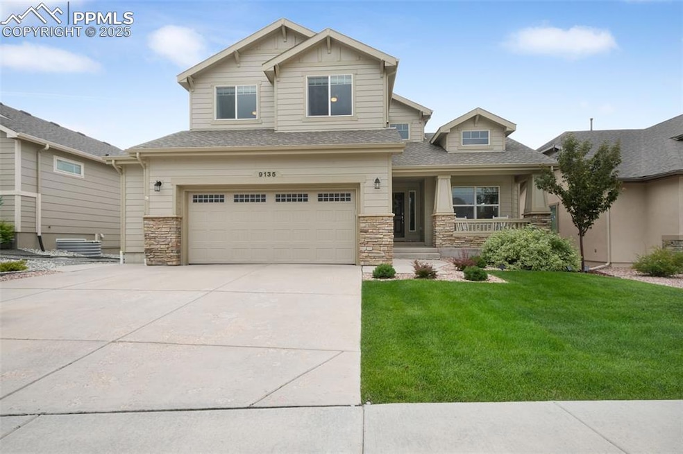 Front of home, landscaped, large driveway for extra parking